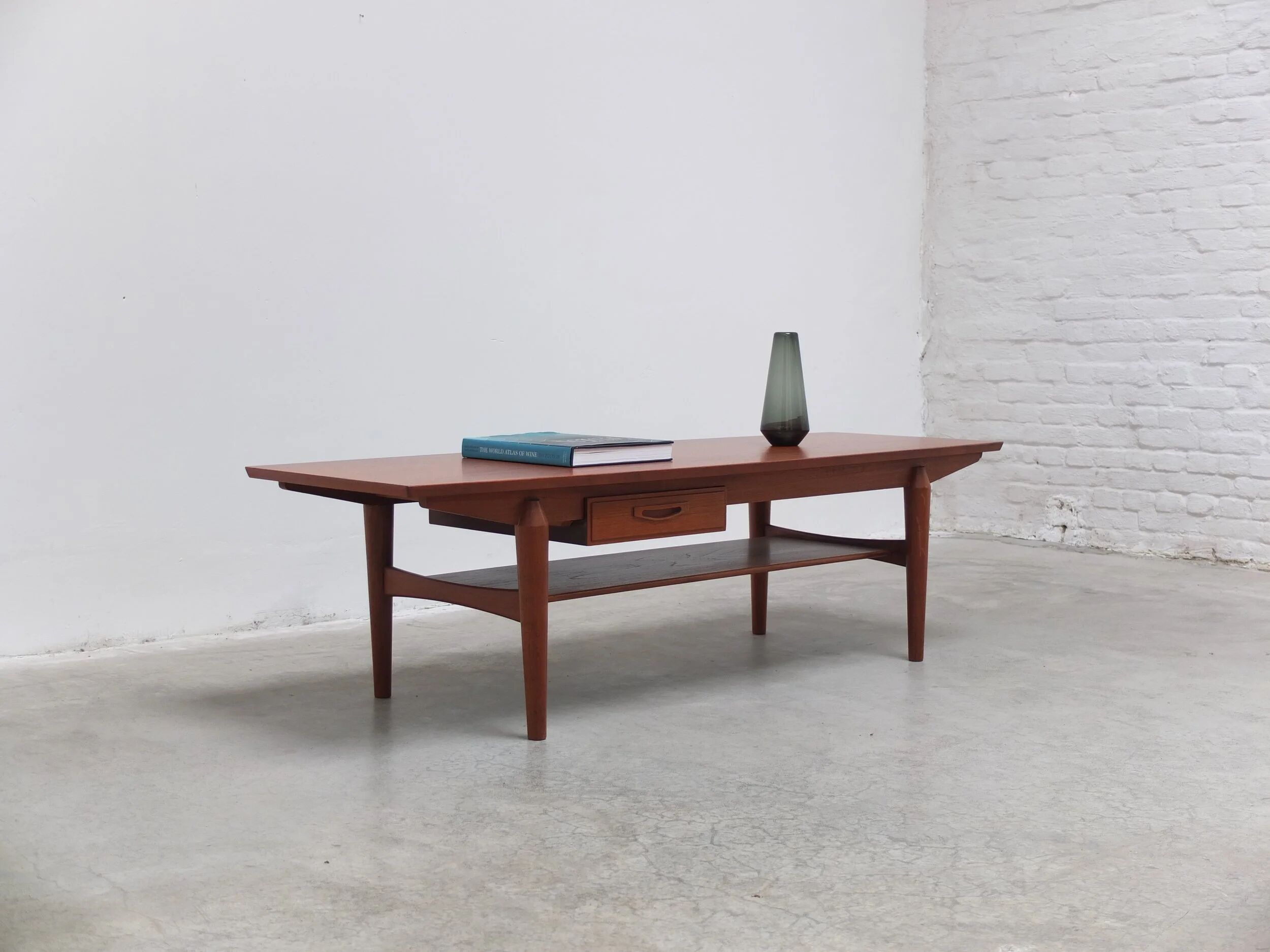 Large coffee table with magazine rack by O.M.F., 1960s