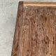 Brown Indonesian teak coffee table, with a border and cylindrical legs H40 L103.