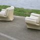 Pair of leather “space age” armchairs. Cream colour". Circa 1970.