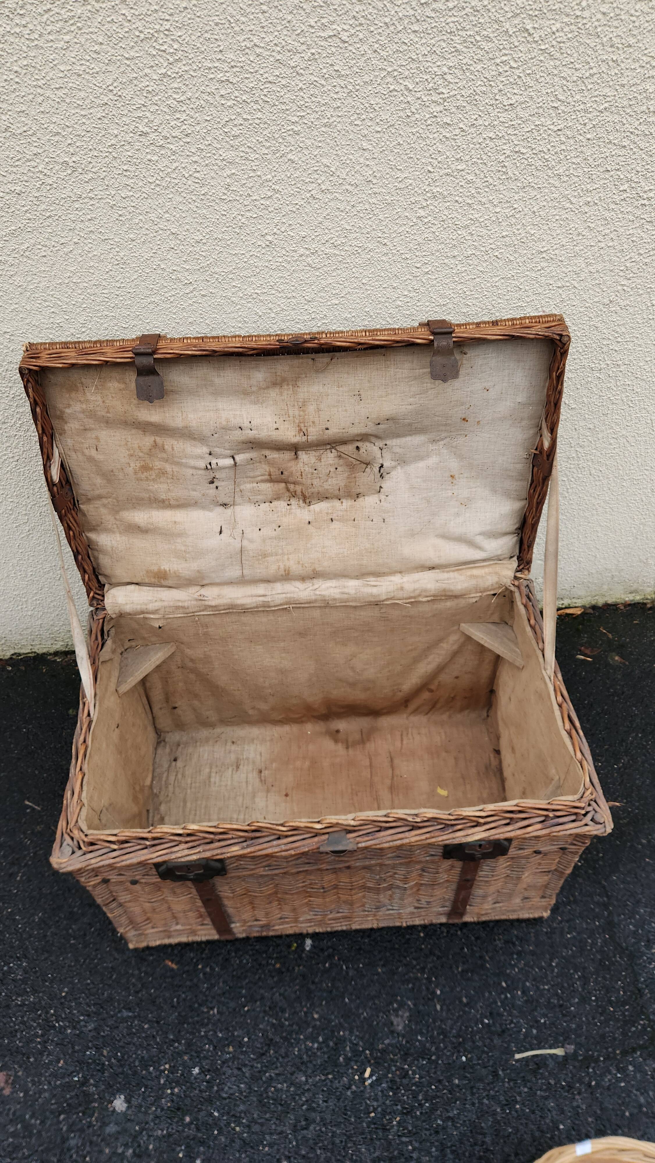 Antique vintage rattan and wicker travel trunk from the 1900s