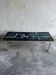 Mid-century Denisco ceramic coffee table — black, blue and white glazed tile top with silver metal base