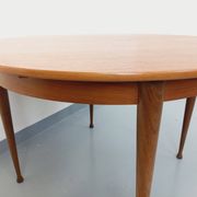 Round dining table in vintage Scandinavian style from the 50s and 60s in teak.