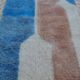 Modern light blue and beige colorful Berber rug