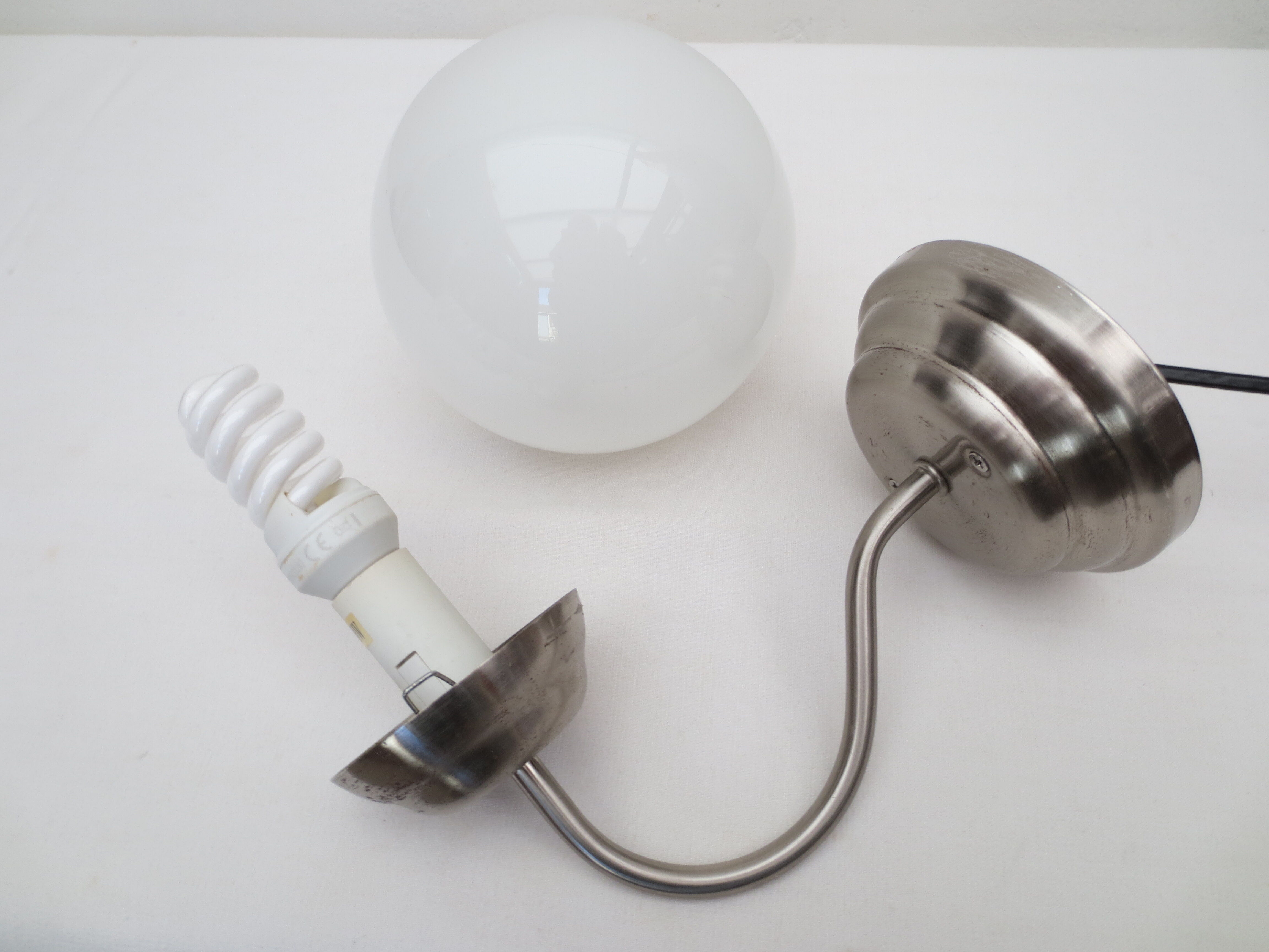 Gooseneck wall lamp, white opaline round globe