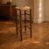 Vintage rustic style bar stool made of solid wood with a straw seat.