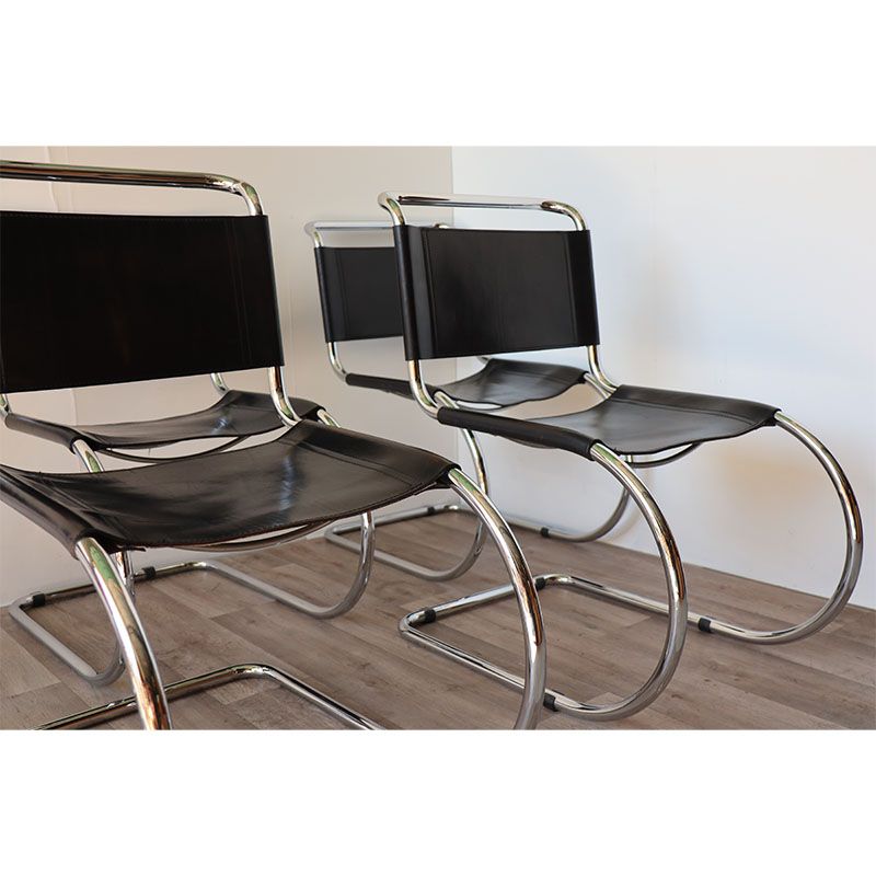 Series of 6 minimalist chairs in chrome metal and black leather around 1970