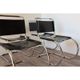 Series of 6 minimalist chairs in chrome metal and black leather around 1970