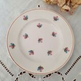 7 mismatched antique dessert plates accompanied by a pie dish