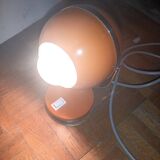 Orange and chrome eyeball table lamp
