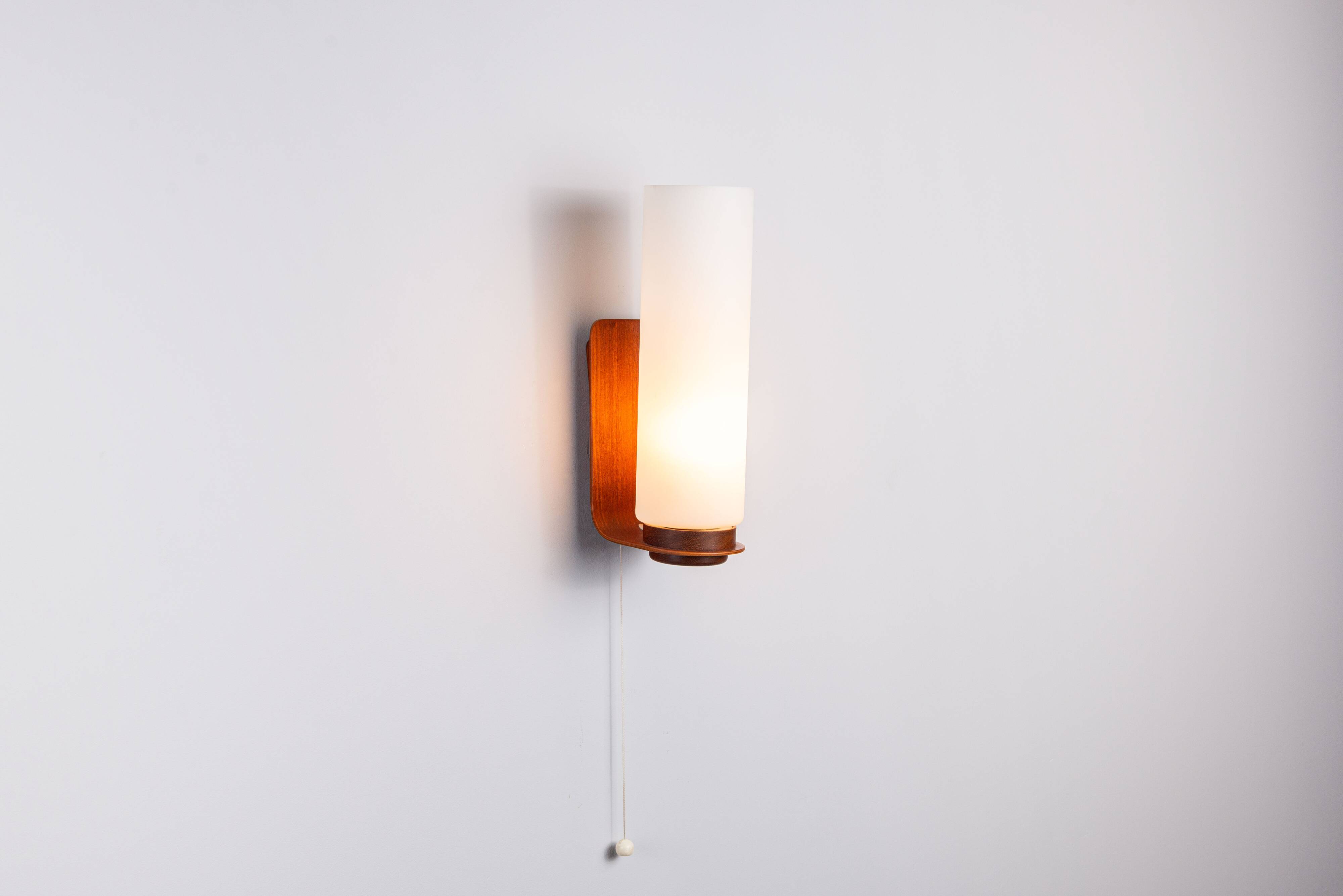 Cilindrical opal glass and bent wood wall lamp