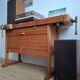 Vintage workbench with vices, antique workshop furniture.