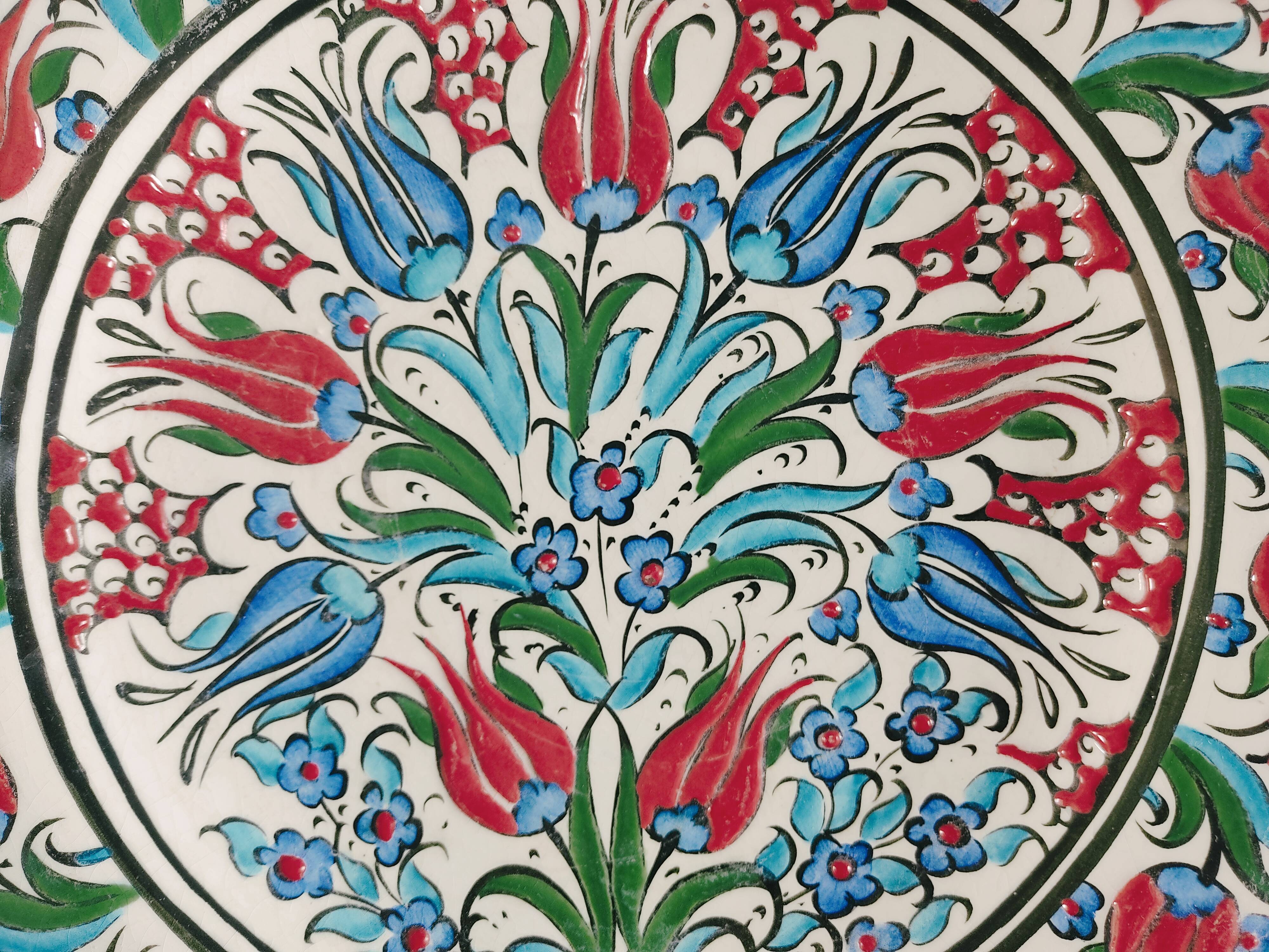 Empty pocket decorated with red and blue flowers