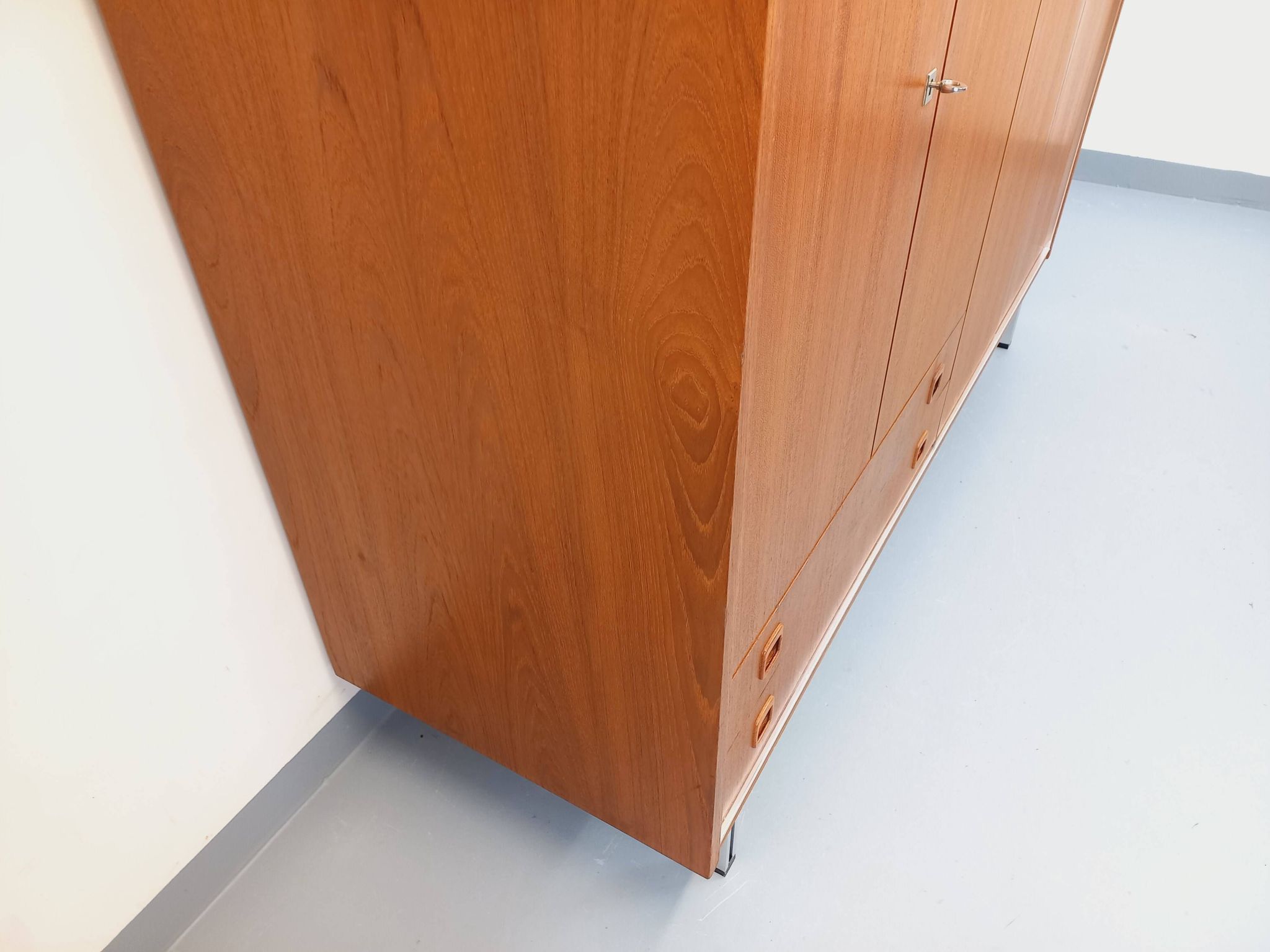 Vintage Scandinavian modernist wardrobe in teak and metal from the 1960s.