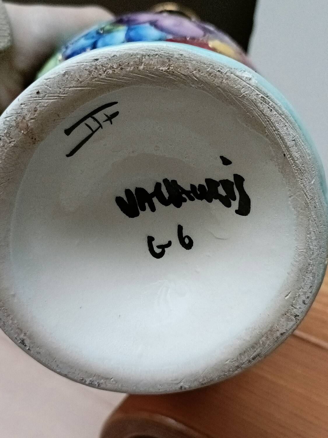 Vallauris vase flowers on black background