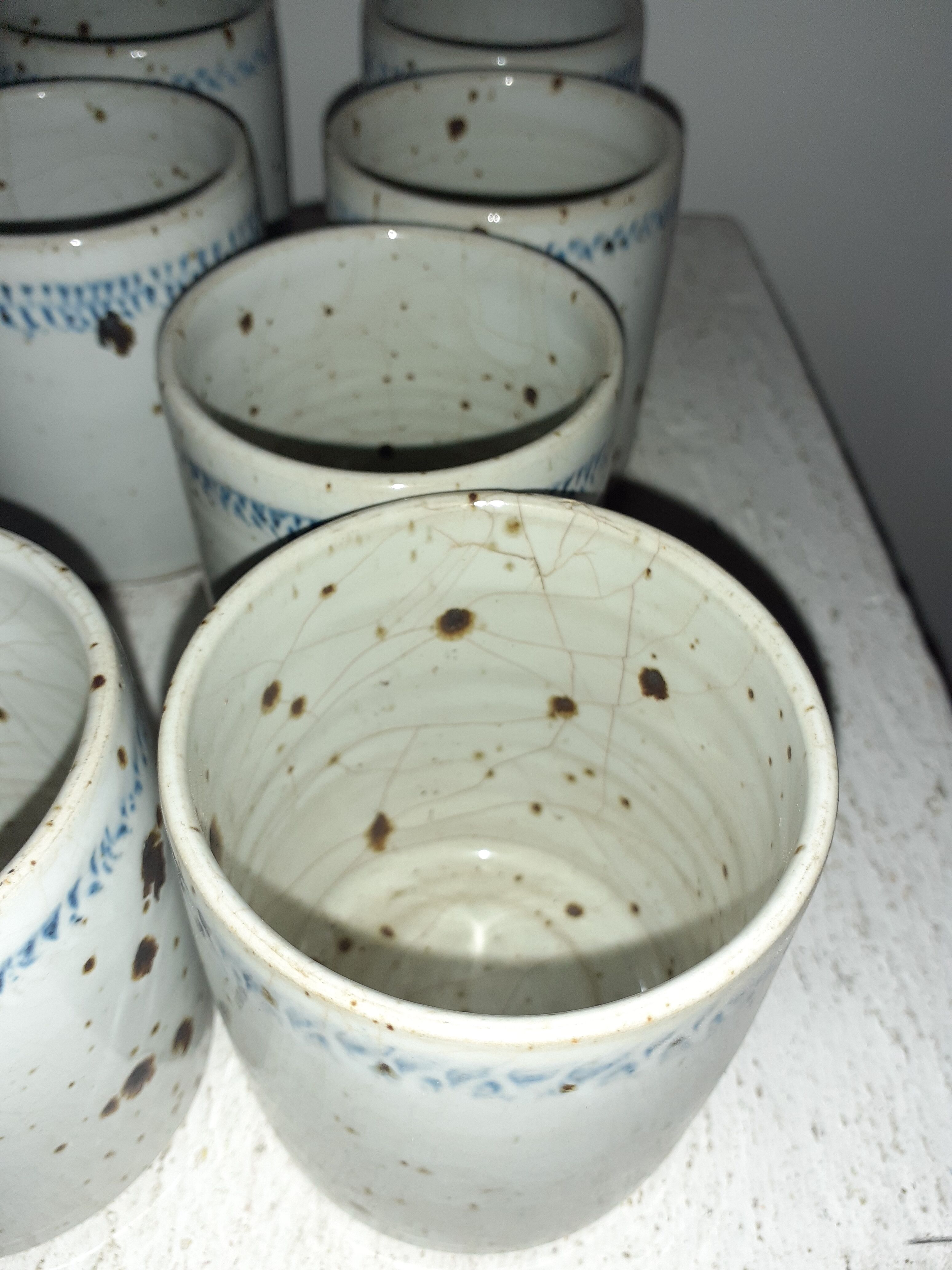 10 cups in enamelled pyrity stoneware