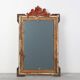 French rococo style richly sculpted gilted oak mirror, 19th century