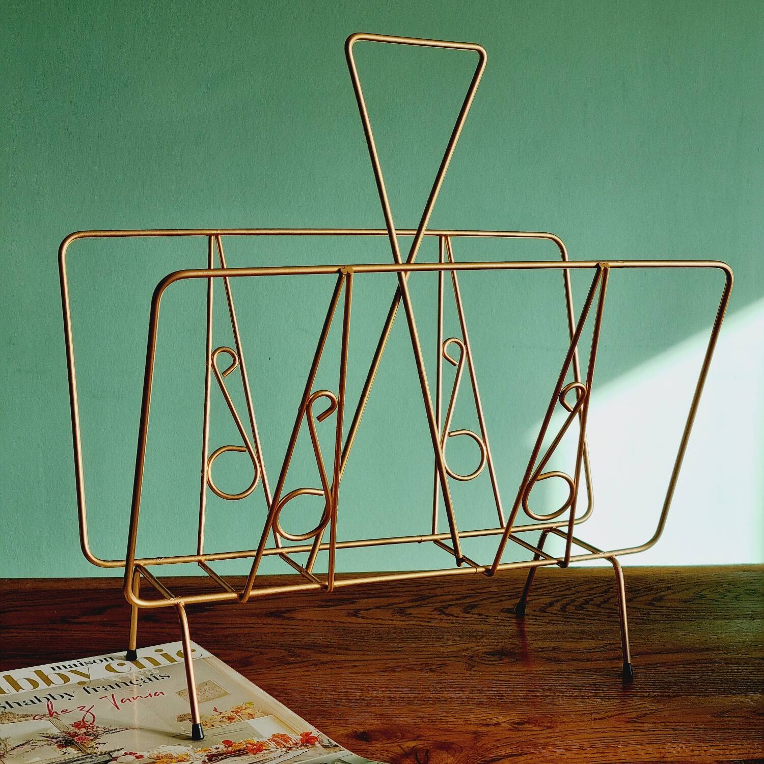 Golden metal magazine holder