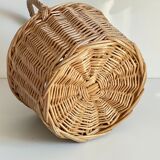 Basket with vintage rattan bottles