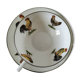 Cup and saucer in porcelain decorated with roosters and hens.