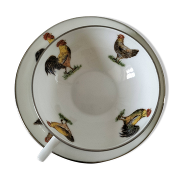 Tasse et soucoupe en porcelaine décor coqs et poules