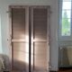 Pair of shutters with wooden shutters in old pink color