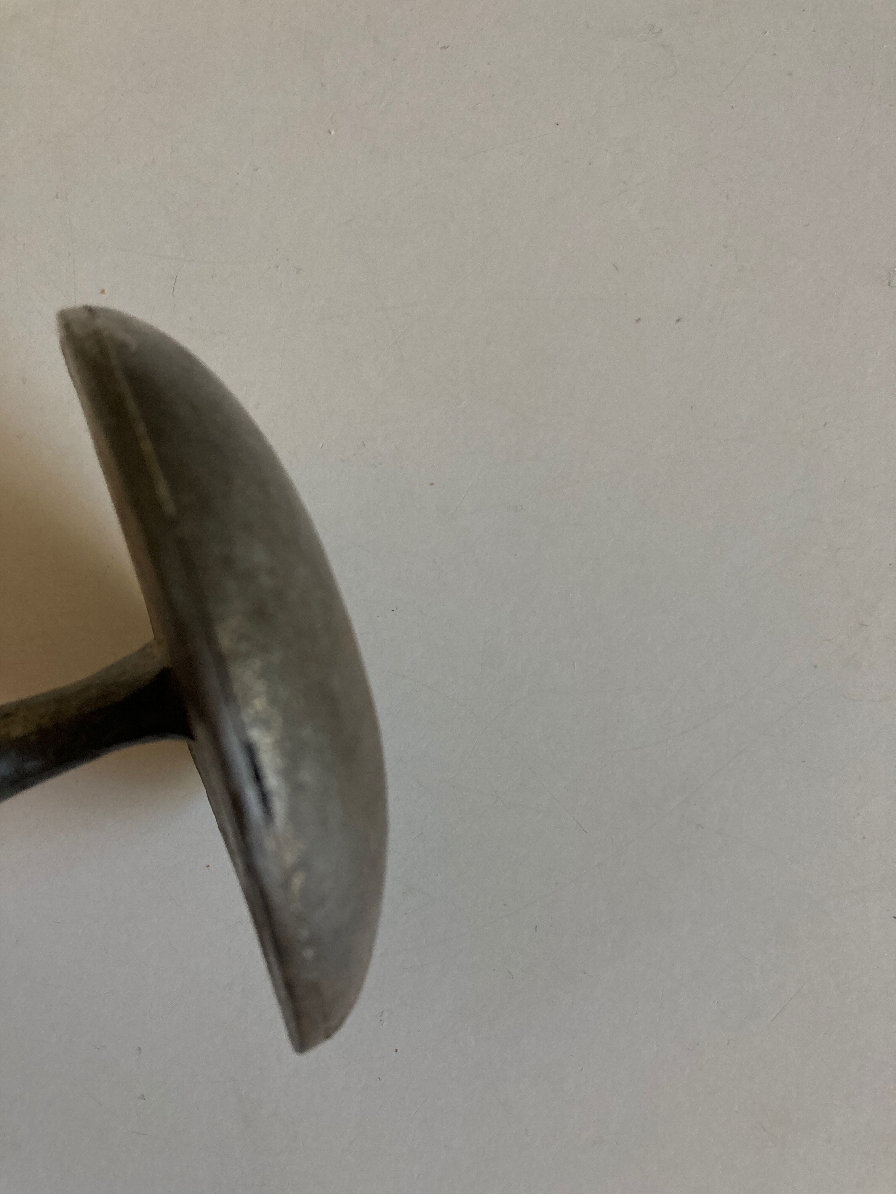 Pedestrian crossing nail hook in Paris 1950