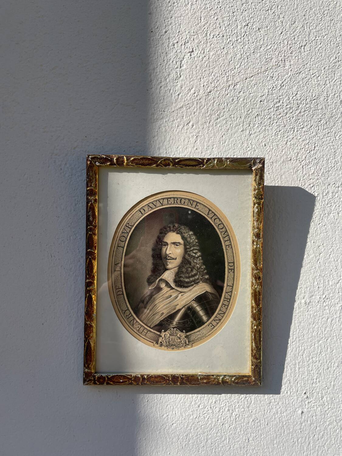 Classic antique man portrait in gilded frame