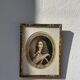Classic antique man portrait in gilded frame