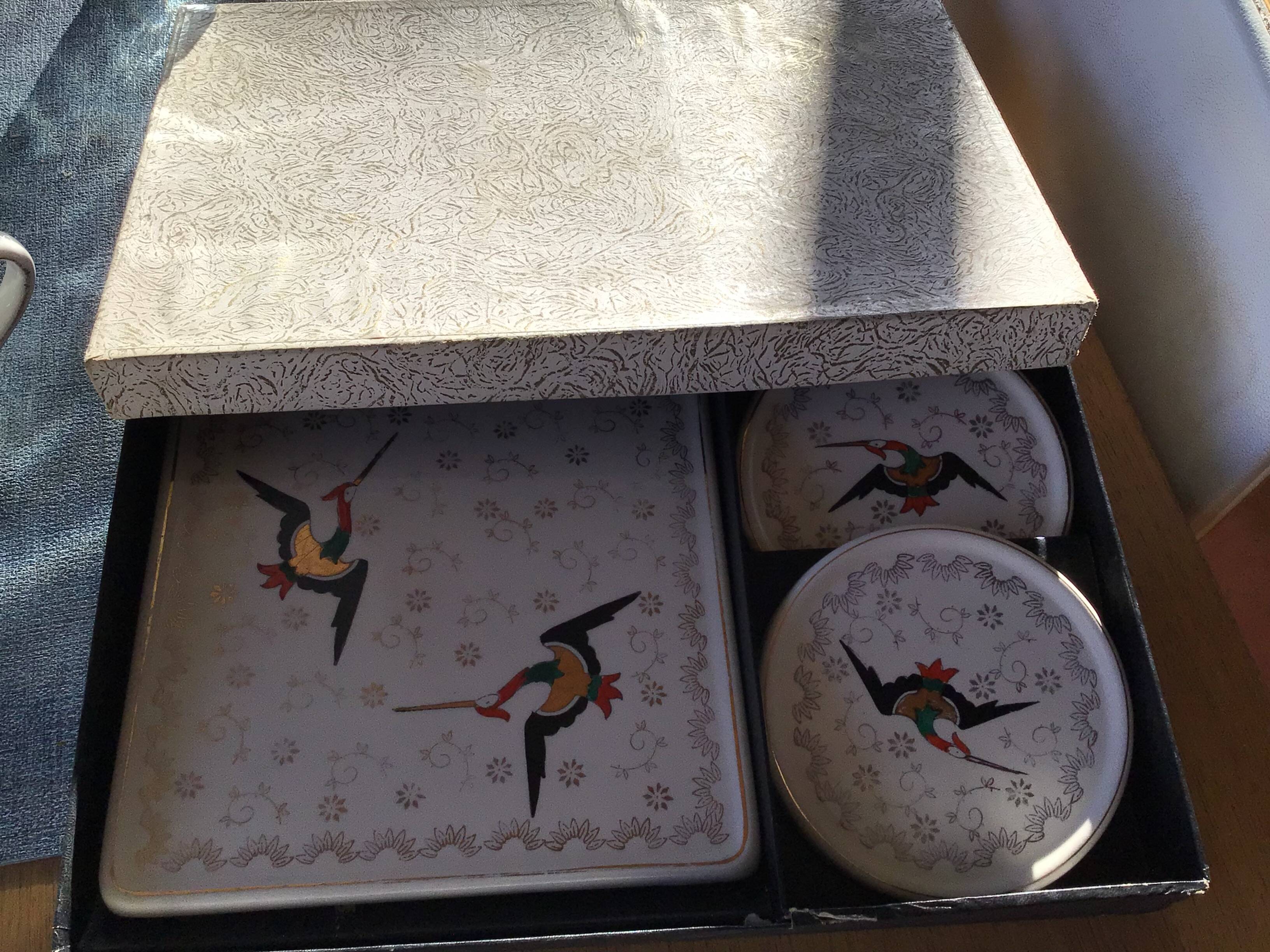 Longwy Chypre cream trivets and bottles