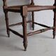 Antique corner chair "fireplace corner" in turned wood and straw.