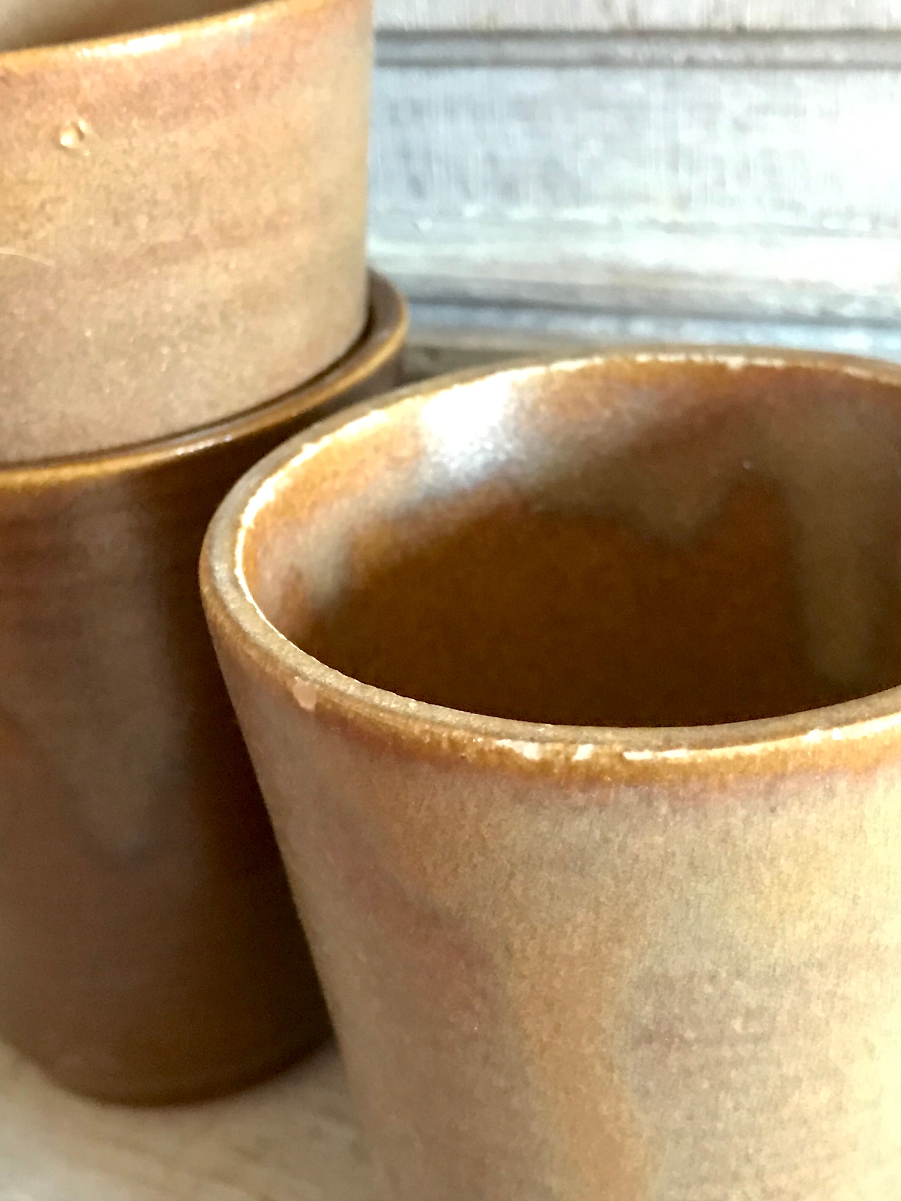 Lot of six Digoin mugs in sandstone