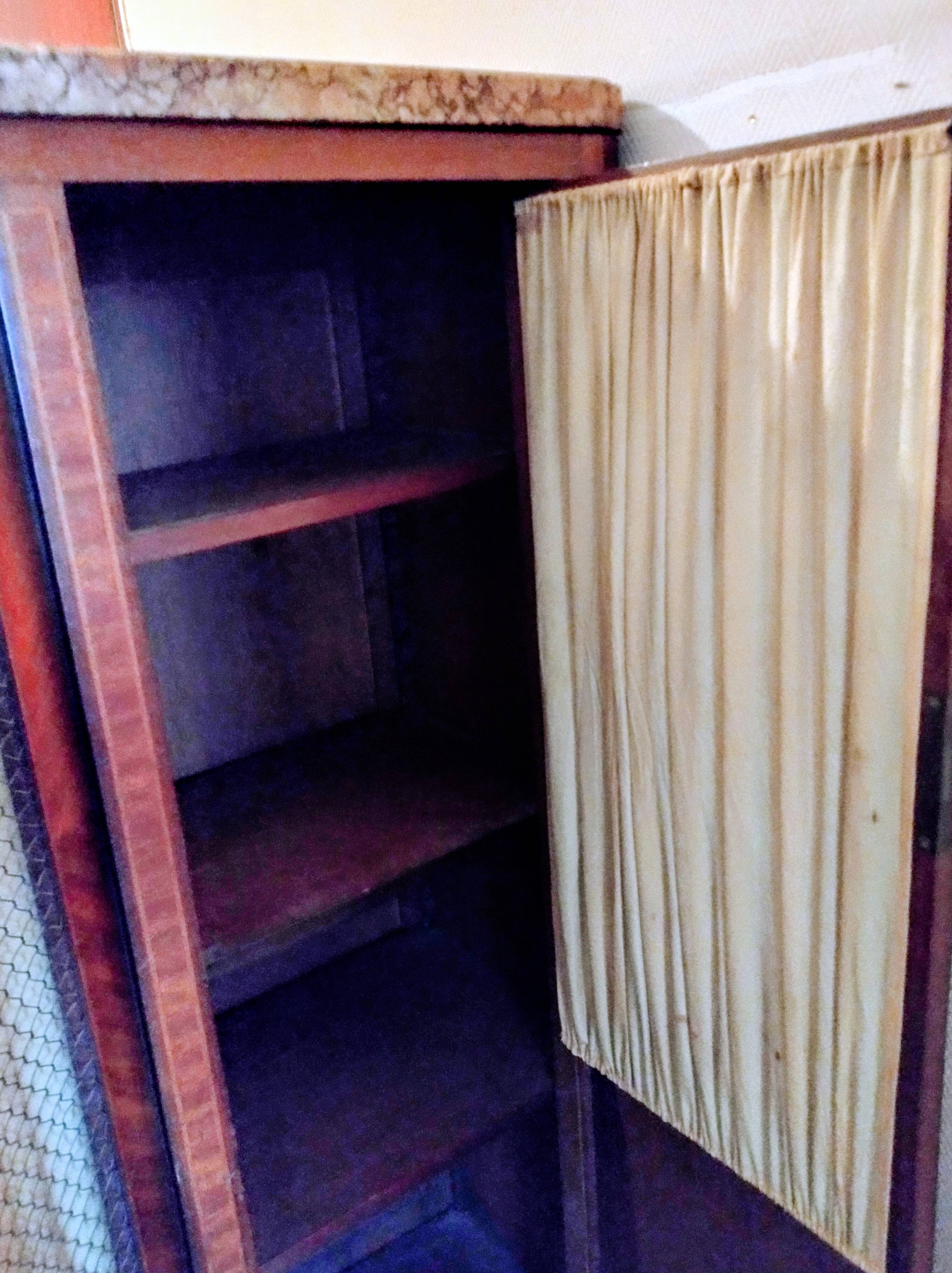 Antique wardrobe in Louis XVI style