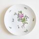 Chinese plate with hand-painted flowers