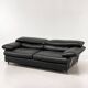 Two-seater black leather sofa from Roche Bobois with a chrome frame.