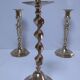 Three vintage solid brass candle holders