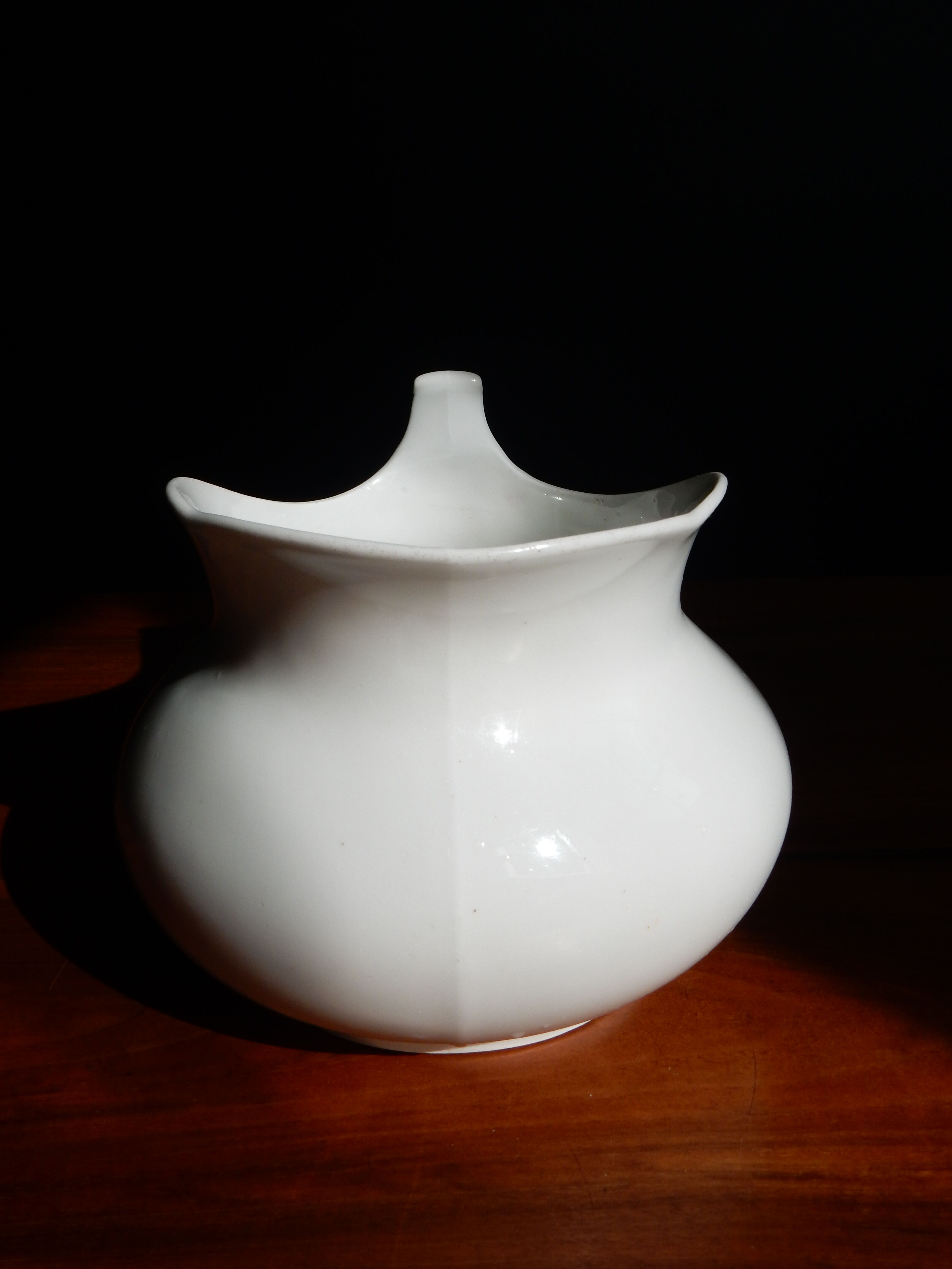 White ceramic water pitcher broc pot
