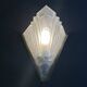 Pair of Art Deco wall sconces in molded glass and gilt brass, 1930