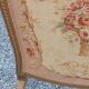 Golden wooden fireplace screen and Aubusson tapestry, 19th century.