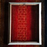 Carved wooden frame, work from the 1950s.