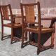 Pair of oak armchairs with straw seats and backs.