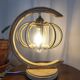 Lampe à poser en rotin formant une lune style Louis Sognot
