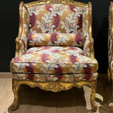 Pair of gilded armchairs