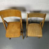 Pair of mismatched wooden folding chairs