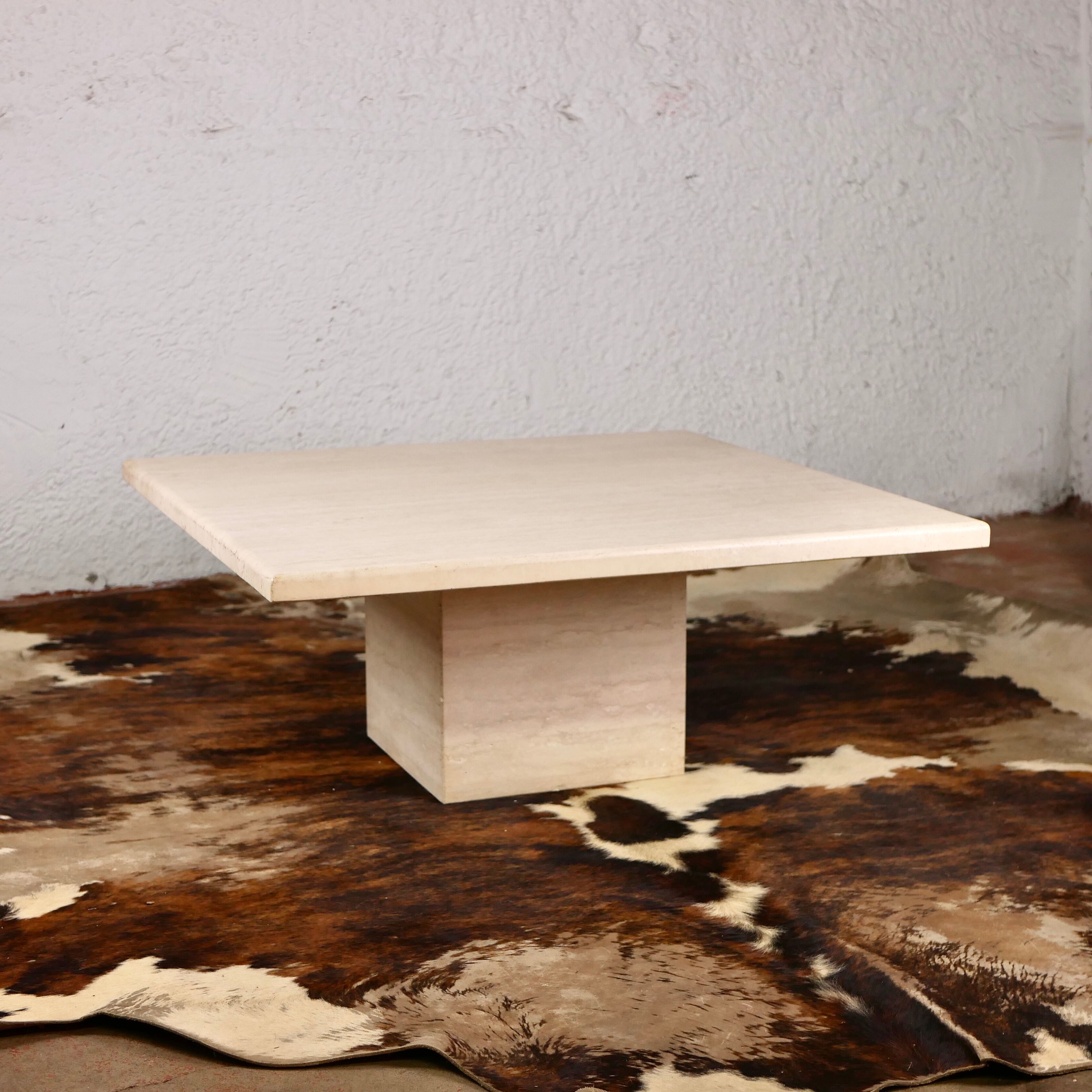 Square travertine coffee table