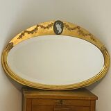 Miroir doré incrusté d'un bijou camée