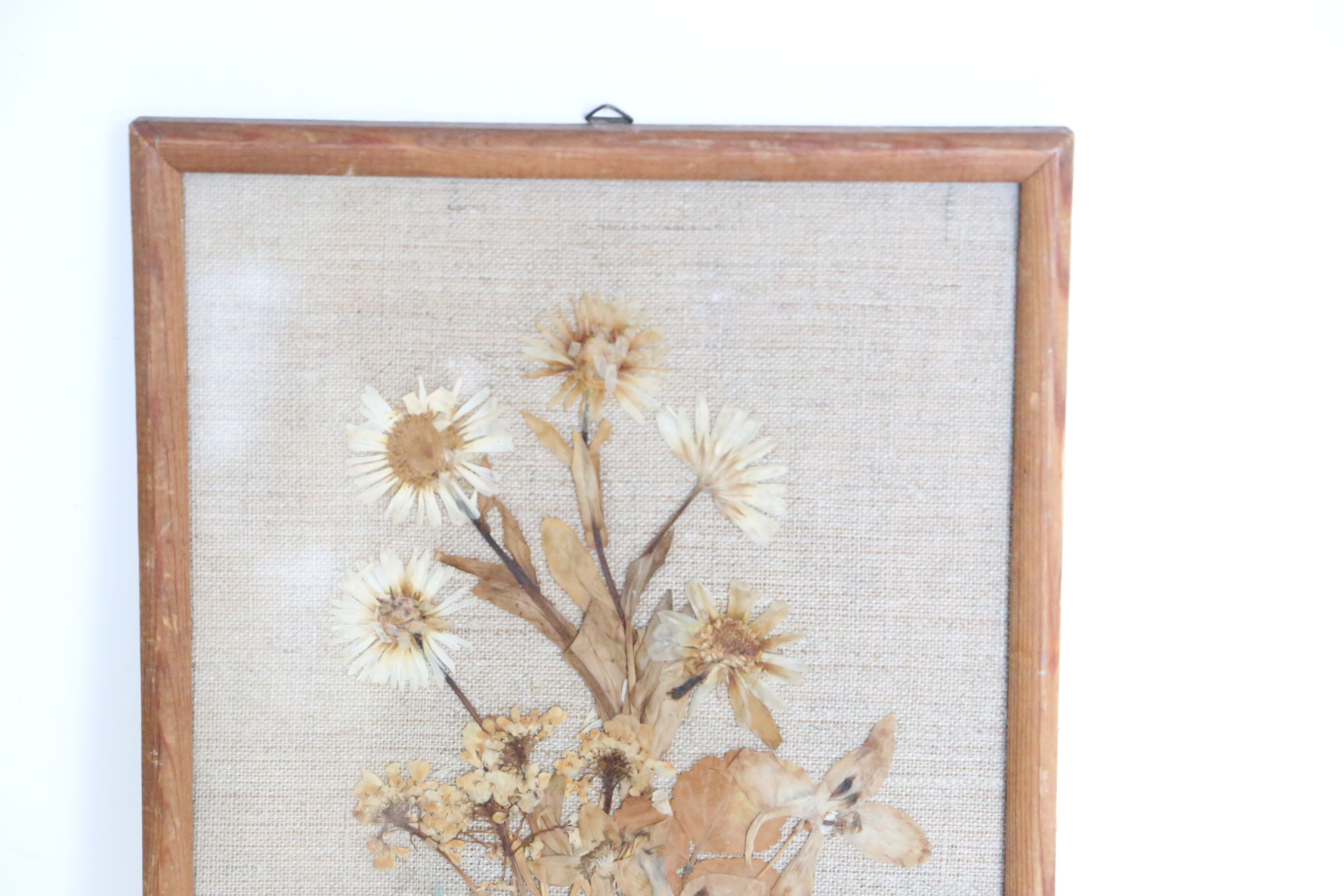 Nice table of dried flowers on beige linen