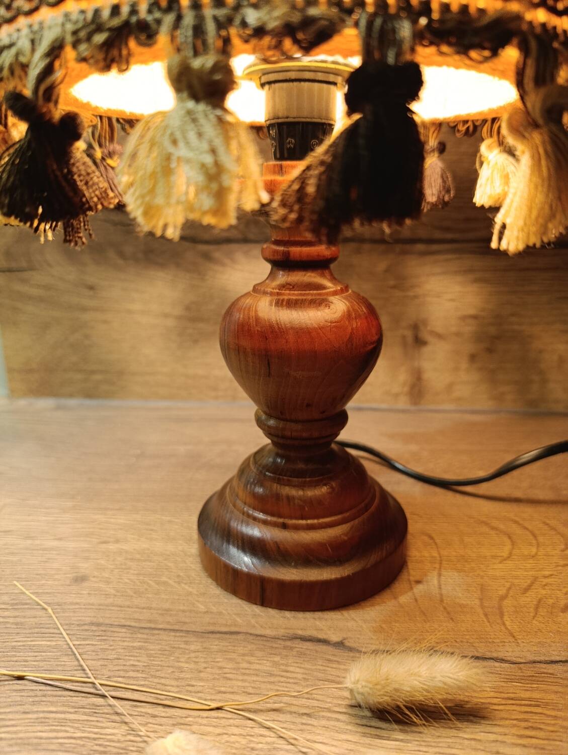 Wood bedside lamp with dome shade in granny chic style.
