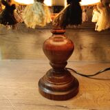 Wood bedside lamp with dome shade in granny chic style.