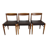 3 vintage Scandinavian chairs in teak and brown leatherette