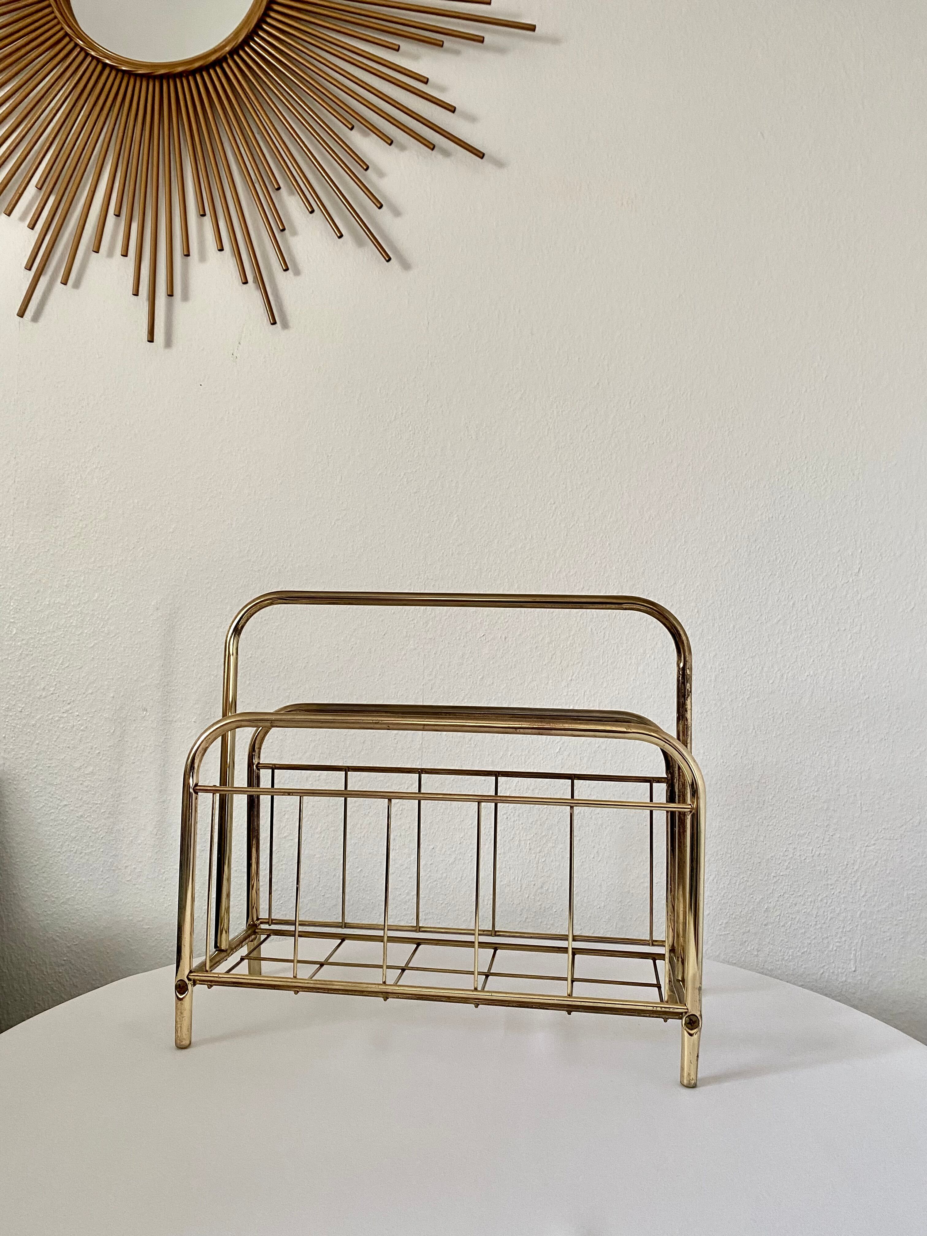 Gilded metal magazine door